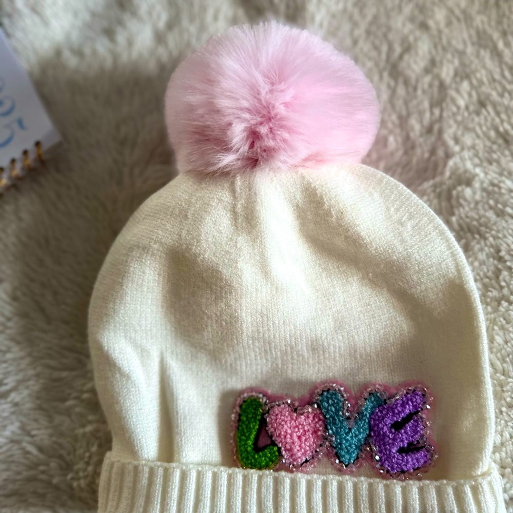 GORGEOUS WINTER “LOVE” HAT WITH PUFF BY BARI LYNN! NEW, NEVER WORN, CREAM, PINK